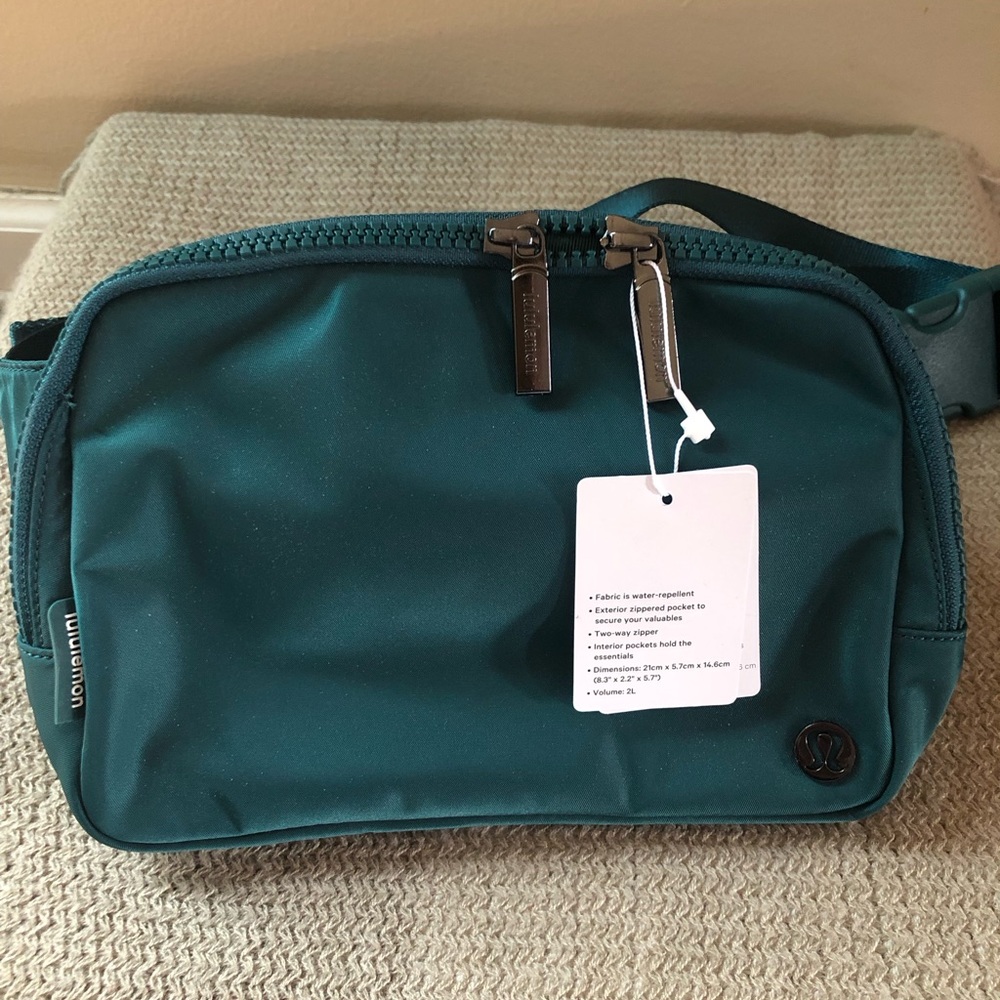 Lululemon dark teal belt bag with tags